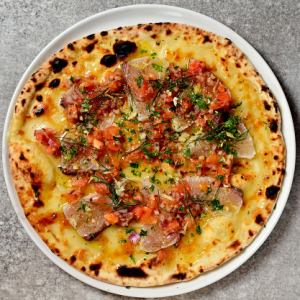 Sicilian-style pizza with grilled amberjack and tomato salsa