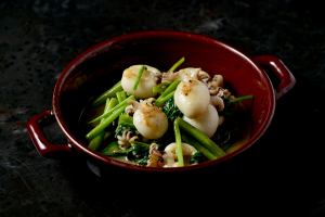 Baby squid and water spinach with anchovy and garlic