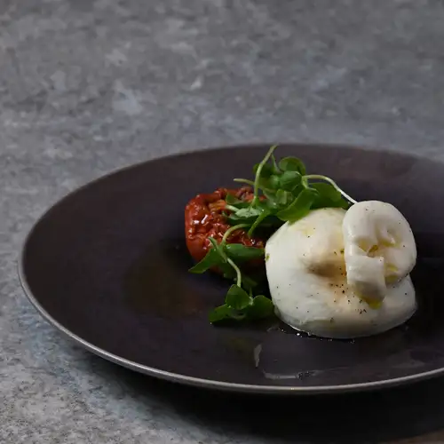 Burrata cheese and semi-dried tomatoes