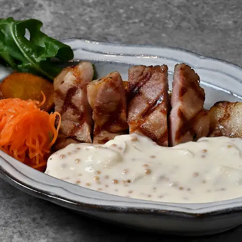 Grilled pork with Tasmanian mustard and honey cream sauce
