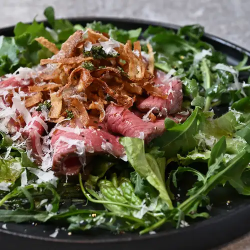 Domestic beef roast beef and arugula salad
