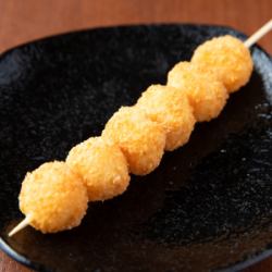 Crispy fried cheese skewers