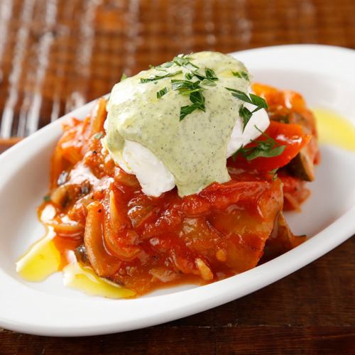 Seasonal vegetable ratatouille with poached eggs and green mayonnaise