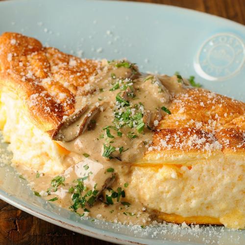 Souffle omelette with rich seasonal cream sauce