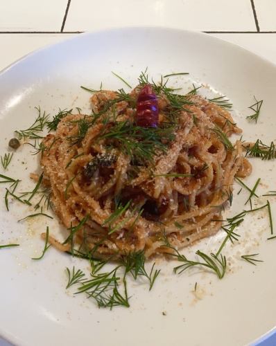 Seafood and herbs in Provencal tomato sauce
