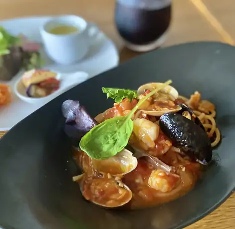 The monthly special for July is "Flavorful Seafood! Fisherman's Style Pescatore" (includes a salad and drink).