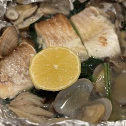 Steamed red sea bream and clams in foil