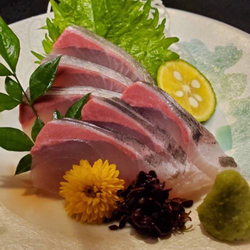 Live amberjack sashimi