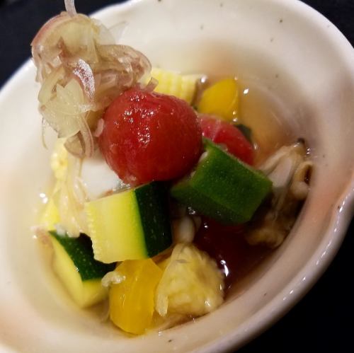 Clams and seasonal vegetables marinated in dashi