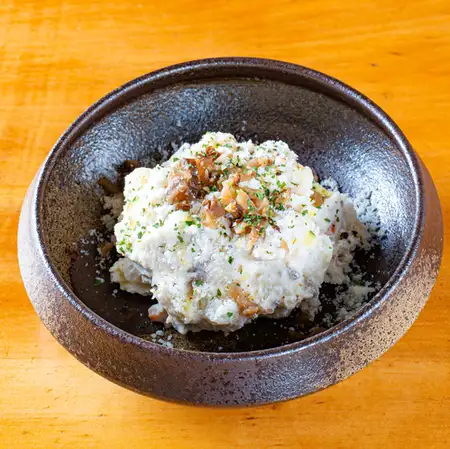 Smoked potato salad with smoked pickled radish