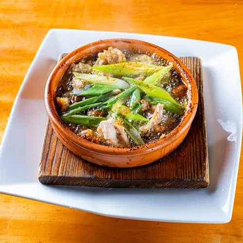 Chicken neck and mushroom ajillo