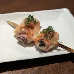Ginger-wrapped boneless chicken wing skewers ~served with pickled plum paste and shiso leaves~