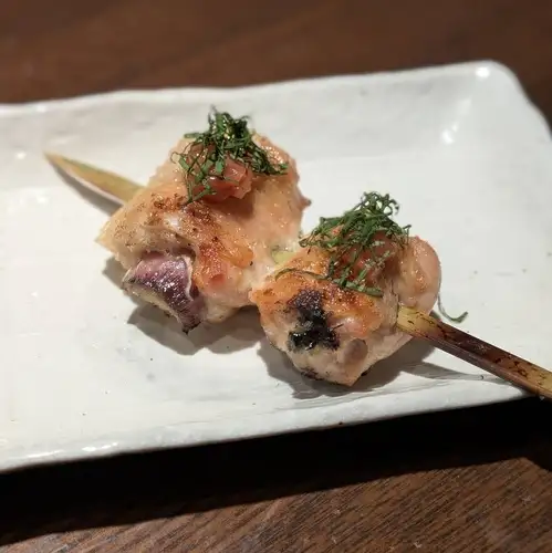 Ginger-wrapped boneless chicken wing skewers ~served with pickled plum paste and shiso leaves~