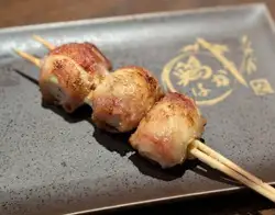 Quail egg wrapped in meat