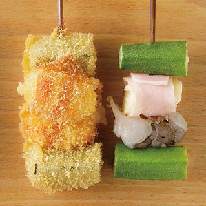 Skewered shrimp, cheese bacon and okra