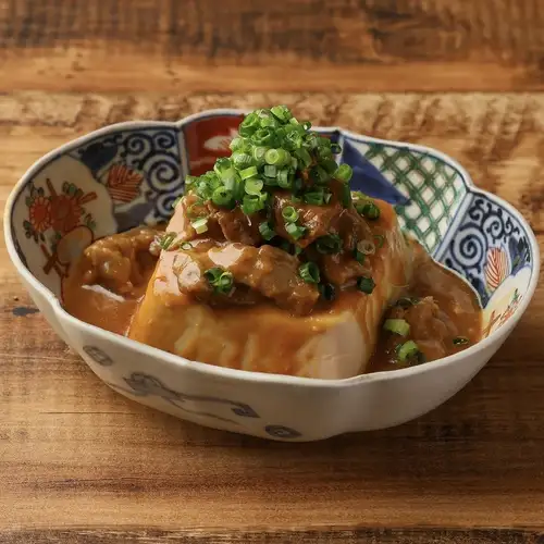 Beef tendon and tofu simmered in miso