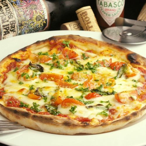Pizza of tomato and basil