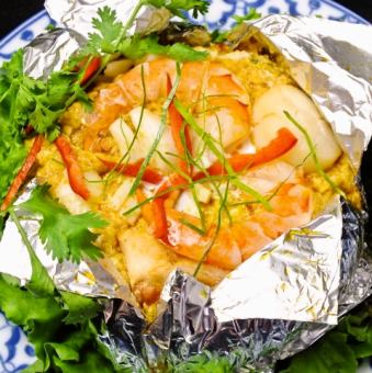 Steamed seafood with red curry flavor