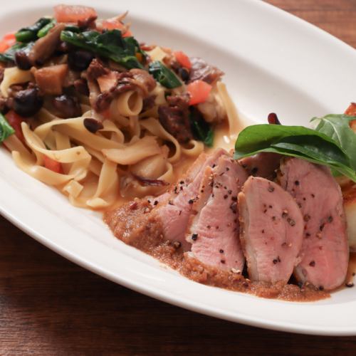 Beef cheek and porcini mushroom ragout tagliatelle & roasted duck breast with apple and balsamic sauce