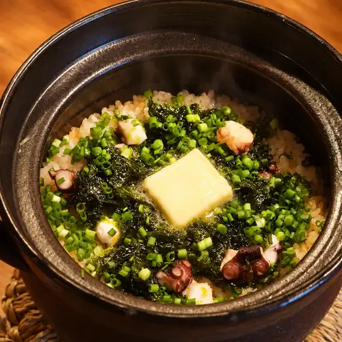 Clay pot rice with octopus and aonori seaweed butter.