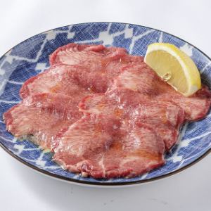 Hand-cut raw beef tongue