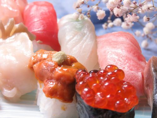 Exquisite sushi held by craftsmen