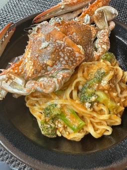 Blue crab and broccoli with tomato cream sauce