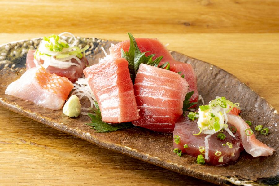 Our specialty... Assorted sashimi (pictured is a 3-piece platter)