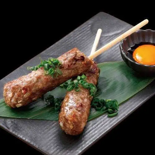 Two beef tongue meatballs with crunchy cartilage.