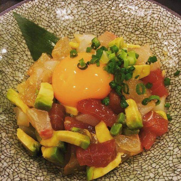 Special dish of fresh fish such as seafood avocado yukhoe