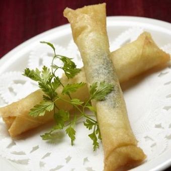 Fried spring rolls with mozzarella cheese and basil