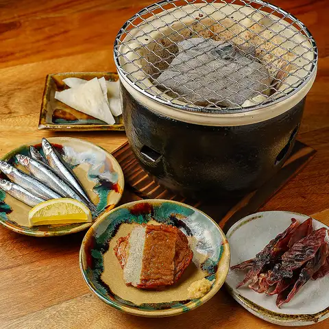 Grilled food on a charcoal grill