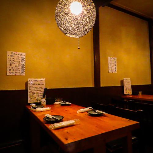 The private room-style table seats for small groups are popular for their stylish lighting.