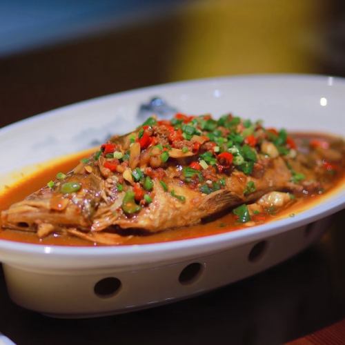 Braised sea bass in special sauce