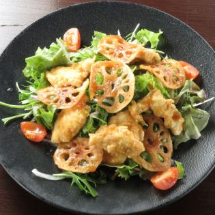 Crunchy lotus root and moist chicken with black vinegar salad