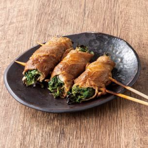 Beef sprouts wrapped in skewers