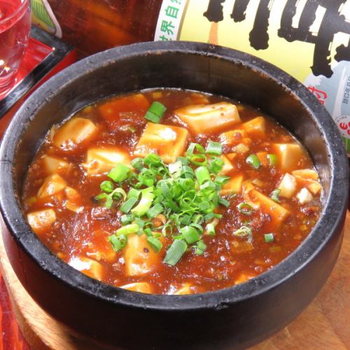 Mapo tofu *Available in spicy or extra spicy versions.