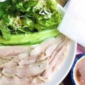 Vietnamese boiled pork wrapped in rice paper