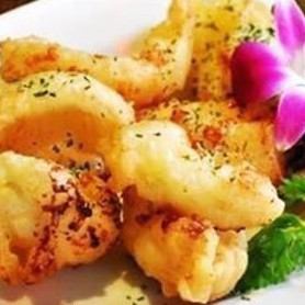 Crispy batter-fried squid stir-fried with charred garlic butter