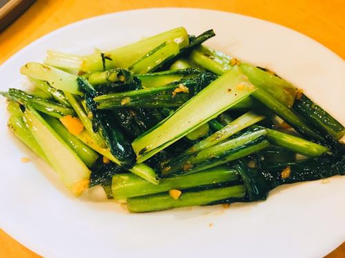 Stir-fried seasonal green vegetables with garlic