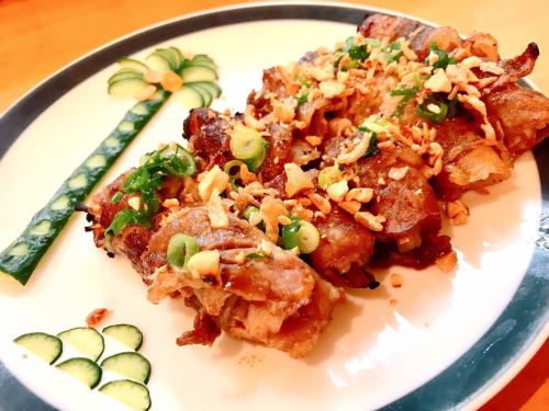 Grilled beef wrapped in enoki mushrooms (4 pieces)