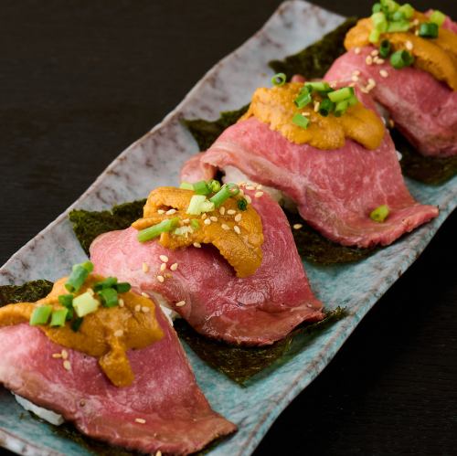 芽ネギとウニの炙り肉手巻き(二貫)