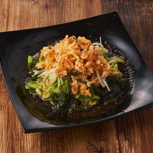 Japanese-style salad with cherry shrimp tempura and sea lettuce