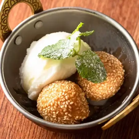 Sesame balls with coconut ice cream