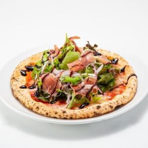 Prosciutto salad pizza