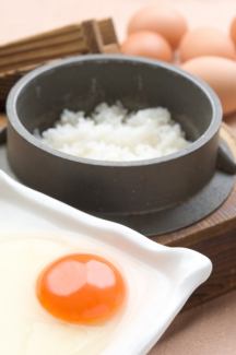 Pot-boiled egg over rice
