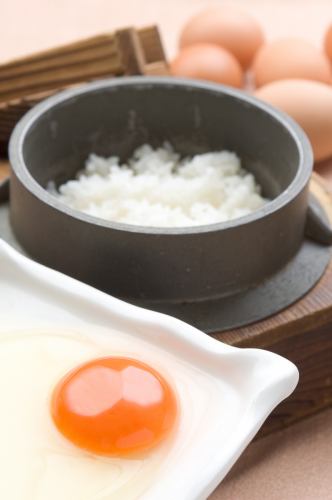 Pot-boiled egg over rice