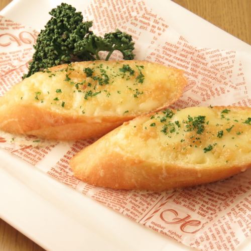 Gruyere cheese and garlic confit toast