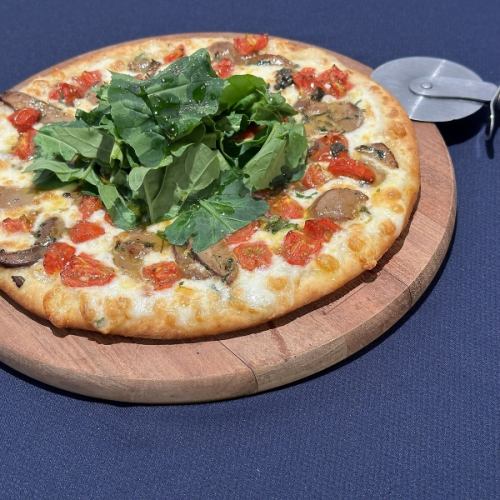 Porcini mushroom and arugula pizza