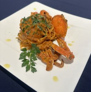 Blue crab in tomato cream sauce